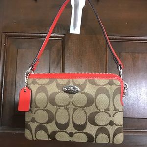 Red and Tan Coach Wristlet